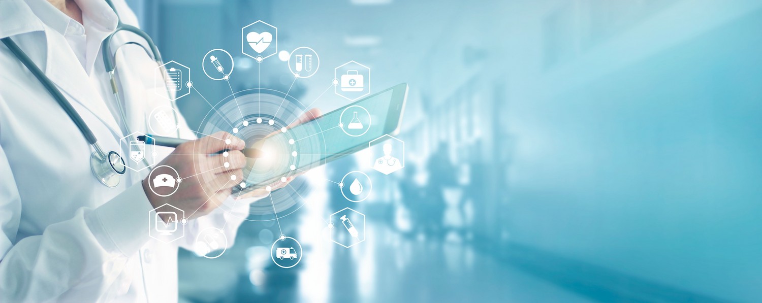 doctor in white coat with ipad and futuristic icons spinning around her