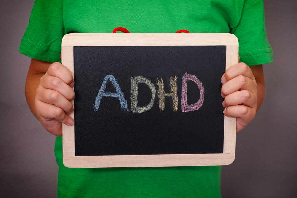 ADHD blackboard held by kid